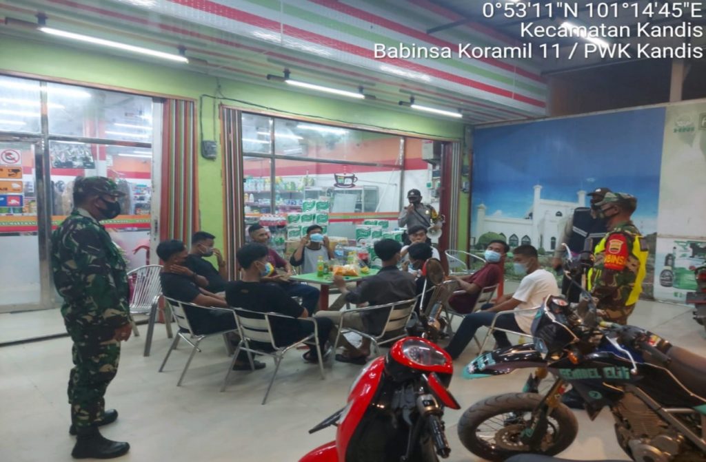 Secara Rutin Koramil 11/Pwk Kandis Laksanakan Giat Prokes di Wilayah Tutorial Kodim 0303/Bengkalis