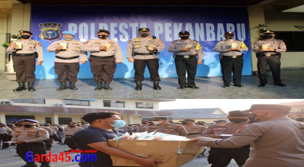 Kapolresta Berikan Reward kepada Babinkamtibmas dan Personil Polda Riau BKO Polresta Pekanbaru atas Pencapaian Trecing Covid-19