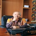 Teks foto : Dr. Yudi Krismen, S.H.,M.H