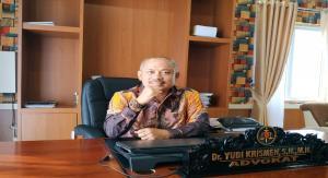 Teks foto : Dr. Yudi Krismen, S.H.,M.H