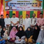 Teks foto : Pengurus DPC PDI-P Kabupaten Bengkalis foto bersama Mbah Kiai H Hasan, Abah Ahmad Fadhli Inayatullah dan Hafidzah diantaranya 6 Hafidzah 30 Juz, Jum'at (28/01/2022) siang.